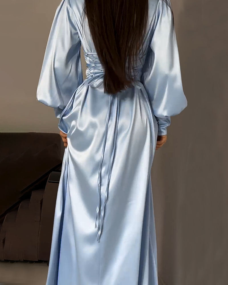 Elegant waisted pleated cuff dress